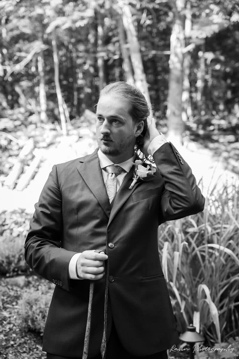 Black and white candid from a Nova Scotia woodland wedding