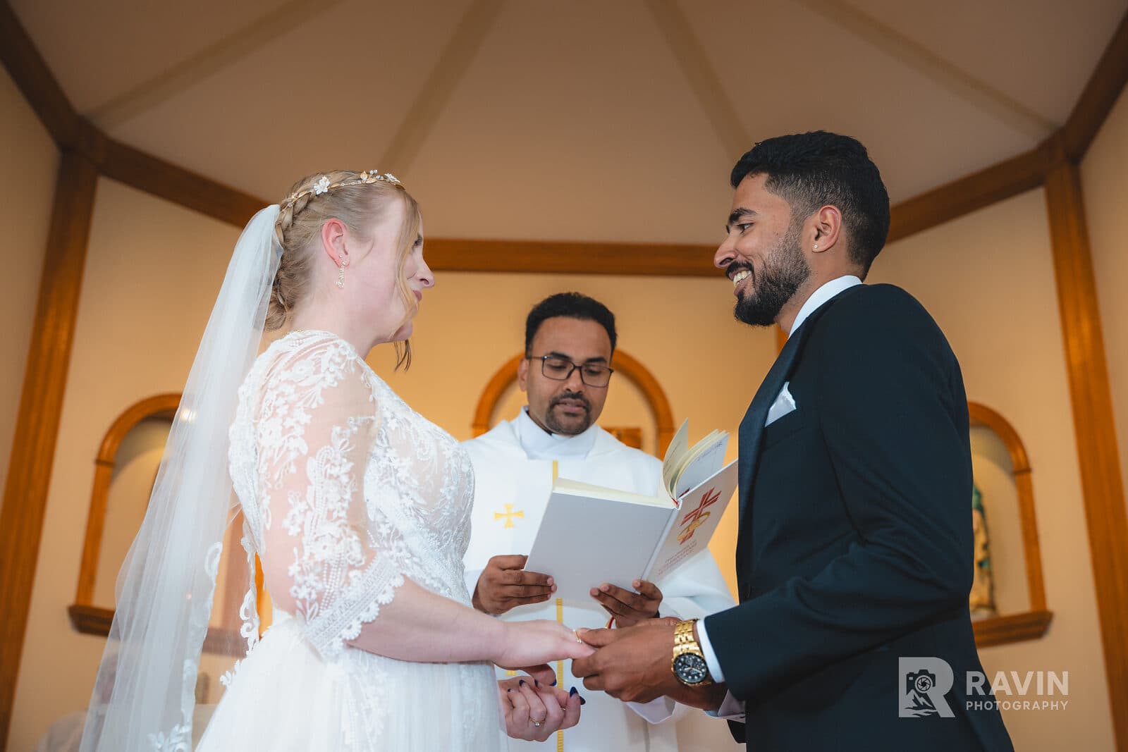 Bride and groom exchanging vows at a Nova Scotia church wedding