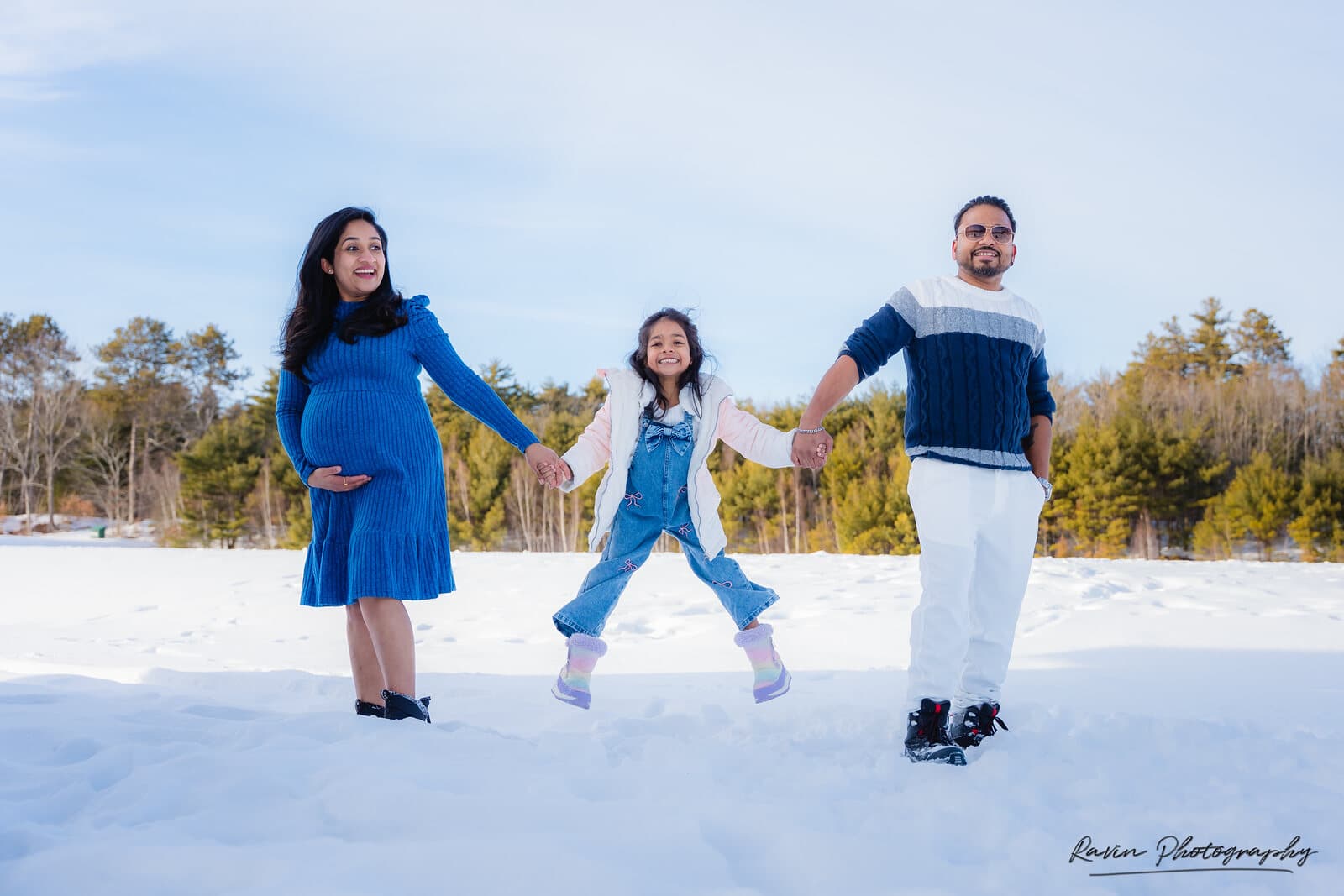 Family walking together through the snow, Nova Scotia winter session