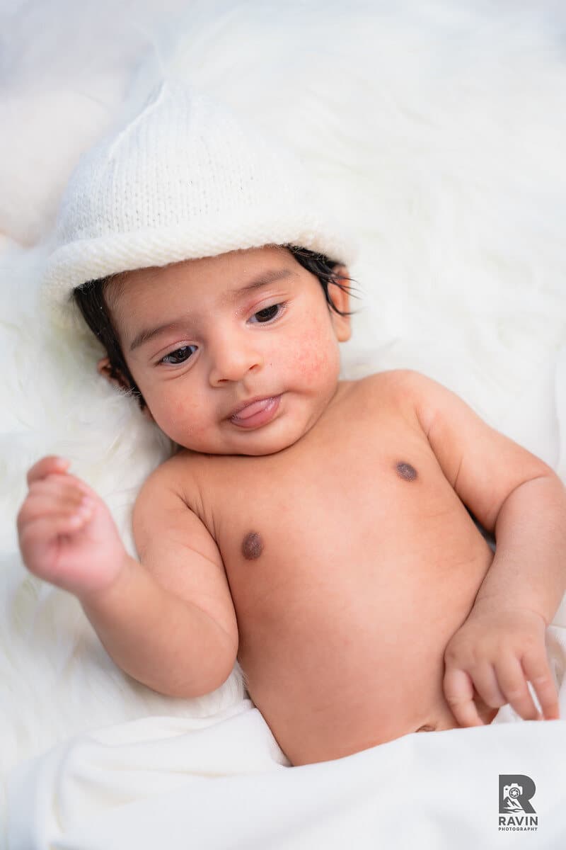 Newborn baby wrapped in white during a Halifax newborn session